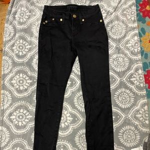 Blue-black denim jeans